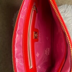 MCM Red Cosmetic Bag with Gold Accents